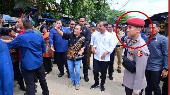 Komisaris Polisi (Kompol), Syarif Muhammad Fitriansyah menyita perhatian saat mendampingi Presiden Joko Widodo berkunjung ke Sulawesi Selatan, Kamis (4/7/2024).