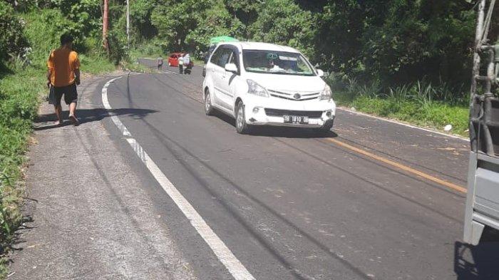 Jalan Trans Sulawesi Desa Munte, Kecamatan Tumpaan, Kabupaten Minsel, Sulawesi Utara, Kamis (18/7/2024).