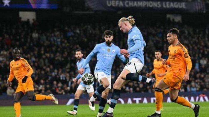 SEPAKAN GOL HAALAND - Aksi penyerang Manchester City Erling Haaland saat menjebol gawang Real Madrid pada babak play-off 16 besar Liga Champions di Etihad Stadium, Rabu (12/2/2025) dini hari WIB.