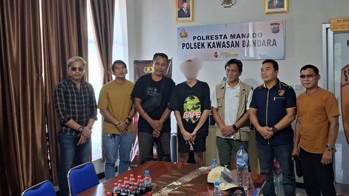 TERSANGKA - Kepolisian Sektor Bandara Sam Ratulangi Manado menangkap seorang Warga Negara Indonesia (WNI) berinisial OSD (29) saat baru mendarat, Jumat (30/5/2025). Ia diketahui pernah menjabat sebagai Human Resources Development (HRD) perusahaan scam di Kamboja.
