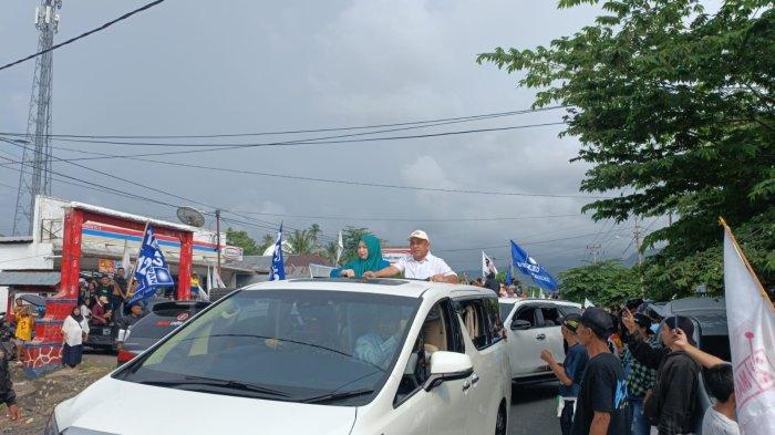 Calon Bupati Bolaang Mongondow, Yusra Alhabsyi, bersama istri dan massa pendukung melakukan konvoi kemenangan, Kamis (28/11/2024).