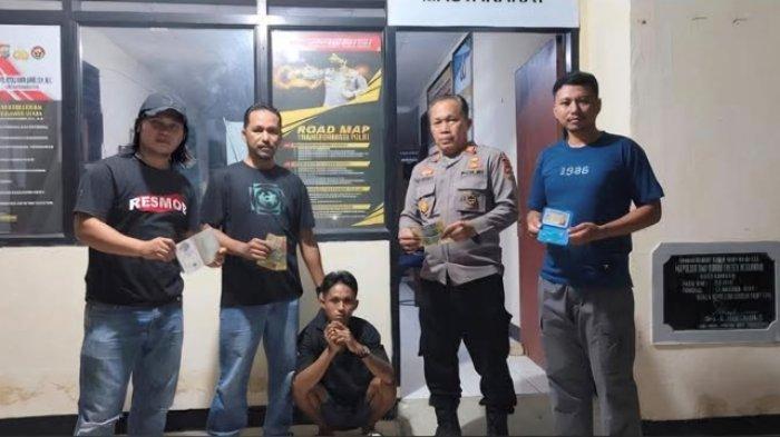PENCURIAN - Tersangka kasus pencurian uang dan barang milik turis asal Australia Fred Josef Spengler saat ditangkap di Kabupaten Boltim, Sulawesi Utara (Sulut). Peristiwa pencurian tersebut terjadi pada Minggu 14 Juli 2025.