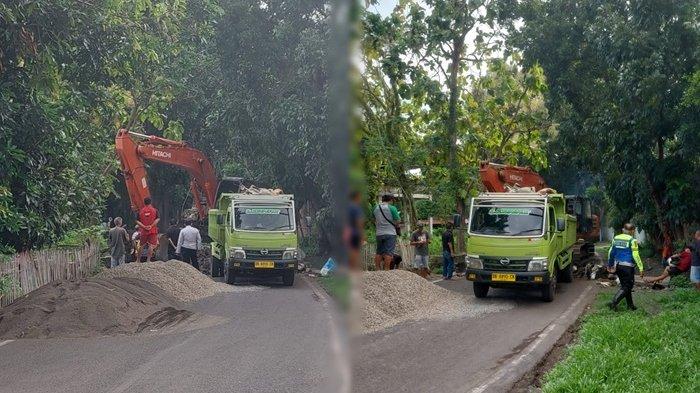 PERBAIKAN JALAN - Aktifitas alat berat saat pengerjaan perbaikan jalan di Bitung Sulawesi Utara, Senin 14 April 2025