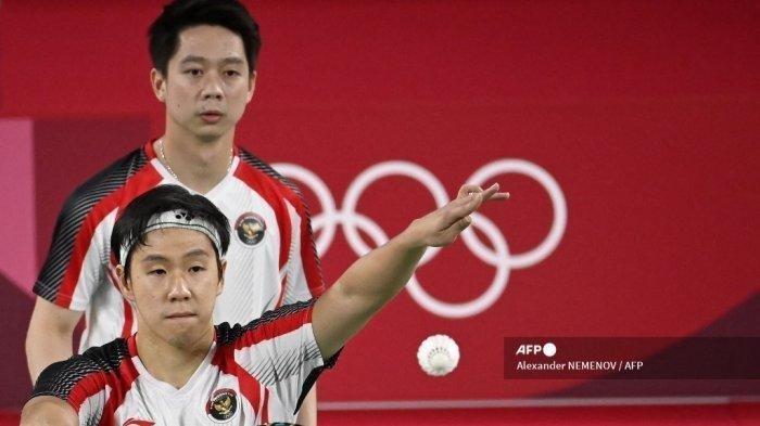 Pebulutangkis Indonesia Marcus Fernaldi Gideon dan Kevin Sanjaya Sukamuljo saat bertanding di Olimpiade 2020 Japan.