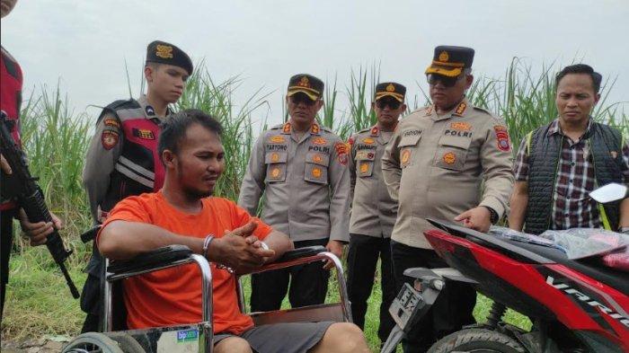 WANITA DIBUNUH: Momen Kapolrestabes Medan Kombes Gidion Arif Setyawan, menginterogasi Edy Subayu, tersangka pembunuhanan Risma Yunita, yang mayatnya ditemukan di kebun tebu Jalan Glugur Rimbun, Desa Sei Semayang, Kecamatan Sunggal, Kabupaten Deli Serdang, Sabtu (22/3/2025). Pelaku membunuh korban karena kesal didesak untuk menikahinya dan ingin merebut harta bendanya.