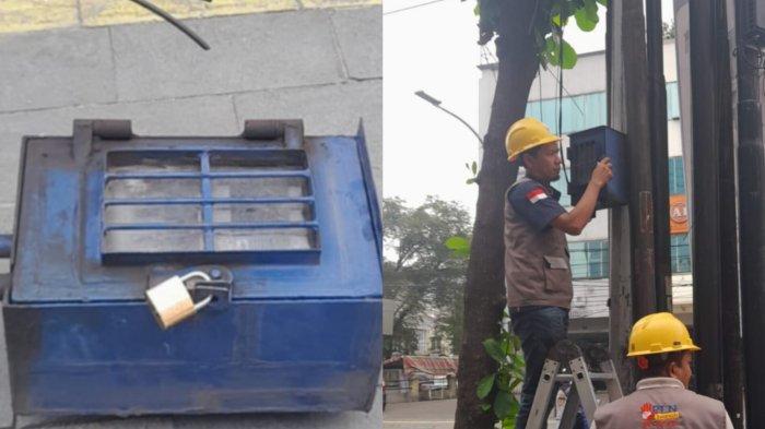 Petugas PLN dan sejumlah petugas Dinas Perhubungan saat mencabut aliran listrik pedagang Martabak di Jalan Gajah Mada Medan, Rabu (15/5/2024). Pencabutan itu dilakukan, karena pedagang martabak berjualan di atas trotoar.