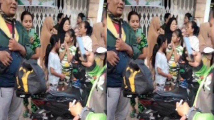 PAKET ISI BAYI: Seorang pengemudi ojek online (ojol) mendapat orderan dari customer tas berisikan bayi. Kamis (8/5/2025).