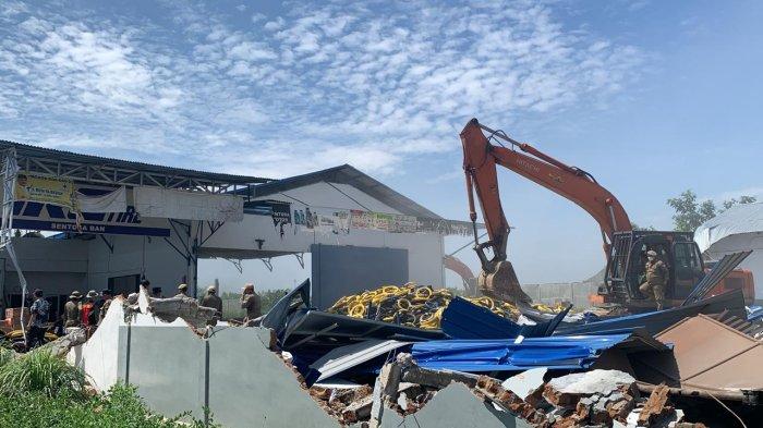 Suasana di Lokasi Eksekusi bangunan di Kampung Kompak, Jalan H Anif, Desa Sampali, Kecamatan Percut Seituan, Deliserdang, Kamis (30/5/2024).