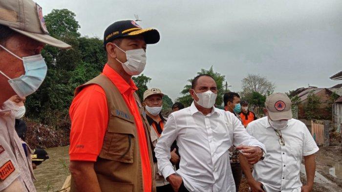 Kepala Kepala Badan Nasional Penanggulangan Bencana (BNPB) Letjen TNI Doni Monardo meninjau langsung lokasi banjir di Perumahan De Flamboyan Desa Tanjung Selamat, Jumat (11/12/2020).