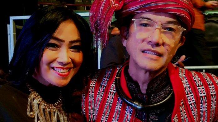 Merdi Sihombing (pakai ikat kepala)