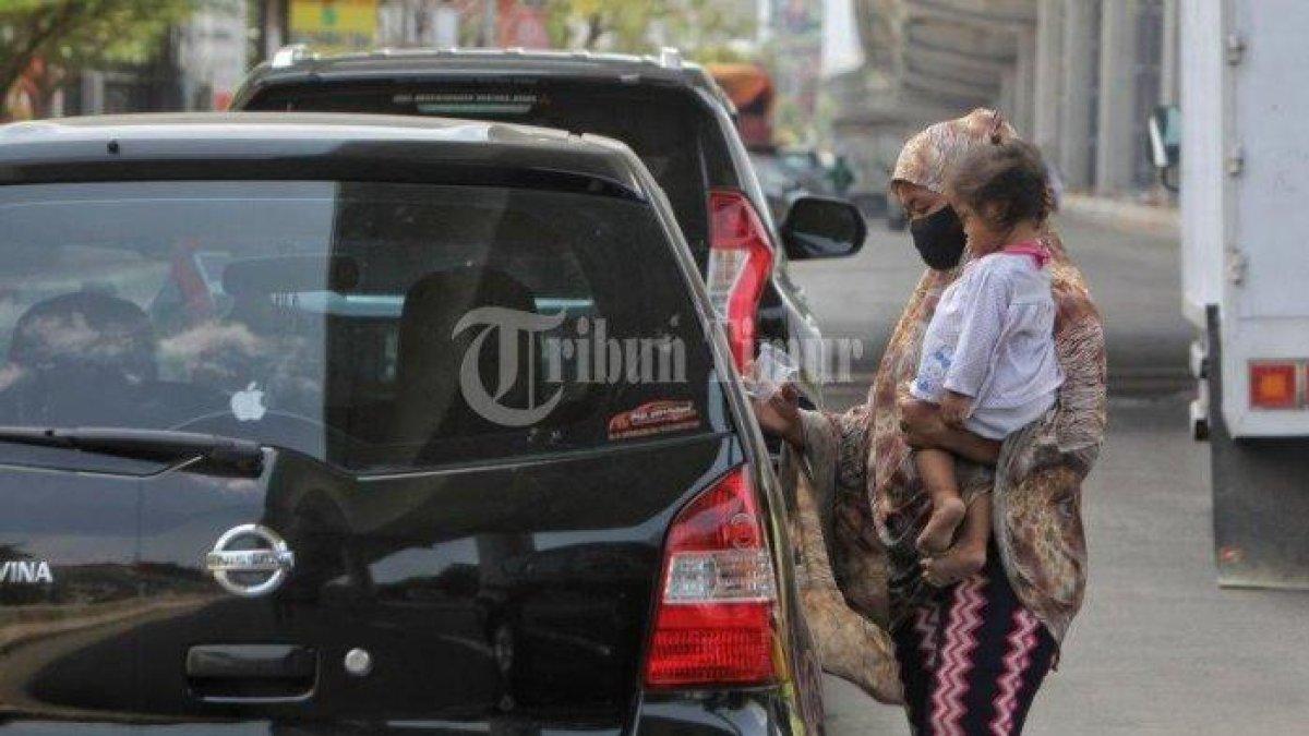 ILUSTRASI pengemis nekat bawa bayi lima bulan di Padang, Sumatera Barat.