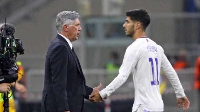 Pelatih Real Madrid, Carlo Ancelotti dan Marco Asensio.