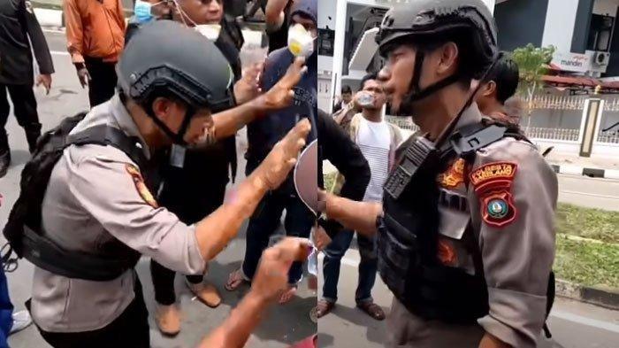Aksi seorang anggota kepolisian Aipda Andi Hidayat saat tenangkan massa demo soal Pulau Rempang, Batam.