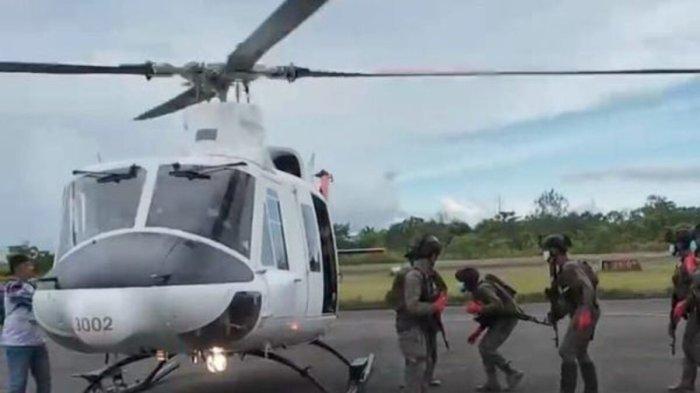 KONTAK TEMBAK KKB - Nampak Proses Evakuasi Jenazah di Bandara Dekai Yahukimo, Papua Pegunungan, Jumat (11/4/2025). Saat dilakukan evakuasi jenazah sempat terjadi kontak tembak antara KKB dan aparat gabungan TNI-Polri.(KOMPAS.COM/Dok Satgas Damai Cartenz)
