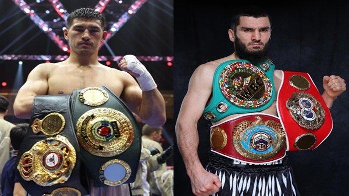 Kolase Dmitry Bivol (kiri) dan Artur Beterbiev (kanan) saat memamerkan gelar Tinju Dunia miliknya.