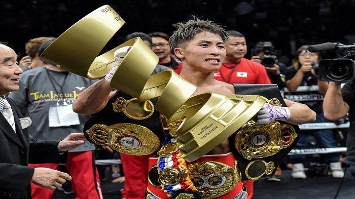 Naoya Inoue dari Jepang merayakan kemenangannya.