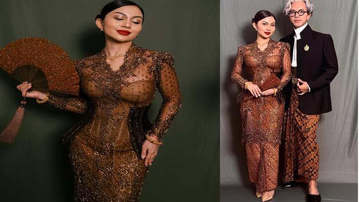 ARTIS- Penampilan Ariel Tatum tak lupa dilengkapi dengan perhiasan berupa kalung antik, gelang putar kuno, dan anting emerald.