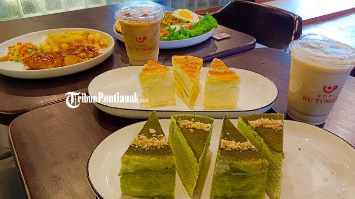 KOPI KUTUNGGU - Mau ngemil atau ngopi santai, Intip varian menu unik Cafe Kopi Kutunggu di Jl Reformasi. Founder Kopi Kutunggu, Andreas Liusvia mengatakan nama Kopi Ku Tunggu sendiri dipilih karena terinspirasi dari tren kopi keliling dengan sepeda listrik yang mulai ramai di Jakarta.