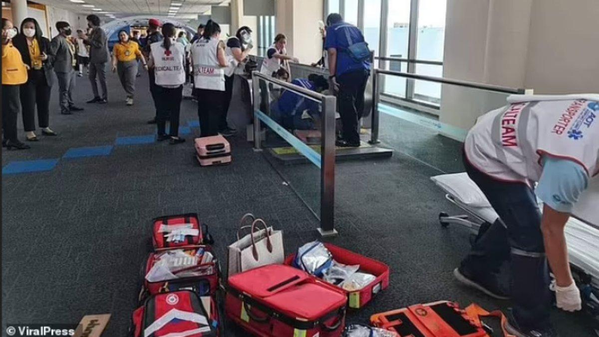 Penumpang yang ketakutan di Bandara Internasional Don Mueang bergegas mematikan mesin yang merobek daging wanita itu.