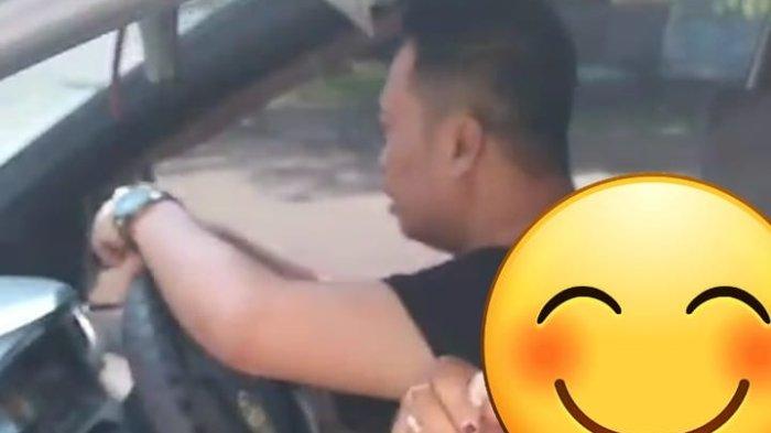 Tangkap layar video viral Kepala Seksi di Disdikpora Sulbar kepergok di dalam mobil bersama istri orang