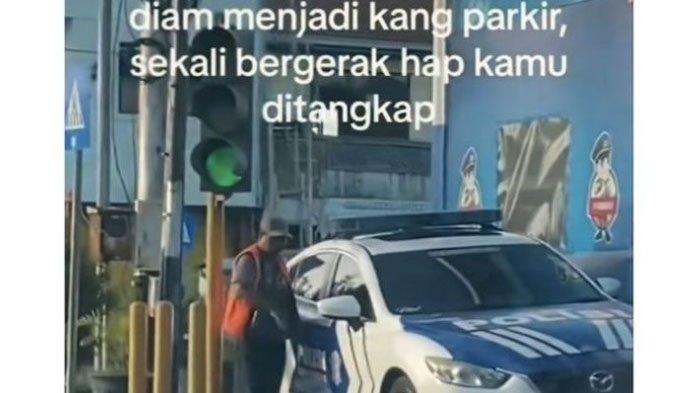 Heboh Tukang Parkir yang diduga intel usai sempat keluar dari mobil polisi