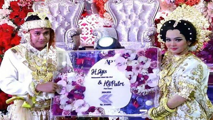 Kabar bahagia tengah datang dari penyanyi dangdut Putri Isnari resmi menikah dengan Abdul Azis anak bos batu bara di Balikpapan Sport and Convention Center, Kalimantan Timur, Sabtu (20/4/2024).
