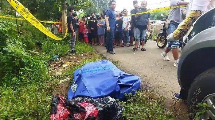Koper berisi mayat perempuan yang diduga korban mutilasi ditemukan di Desa Dadapan, Kecamatan Kendal, Kabupaten Ngawi, Jawa Timur, Kamis (23/1/2025). Polisi mengungkapkan anggota tubuh jasad wanita dalam koper yang ditemukan di Ngawi dalam kondisi tak utuh. Ada kaki hingga kepala hilang.