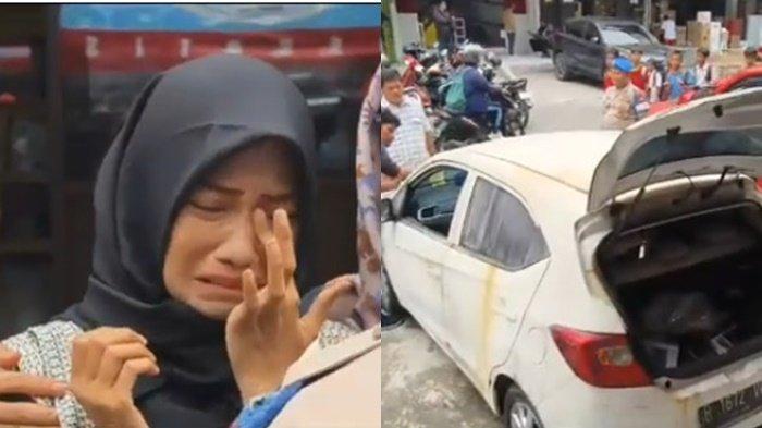 Tangis keluarga Oshima Yukari, salah satu dari 14 orang dilaporkan hilang dalam kebakaran Glodok Plaza, Tamansari, Jakarta Barat saat mobil milik pramugari dievakuasi