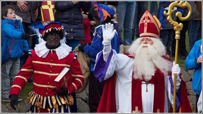 Pit Hitam bersama bersama Sinterklas, sosok yang kerap muncul dalam setiap tradisi Natal.