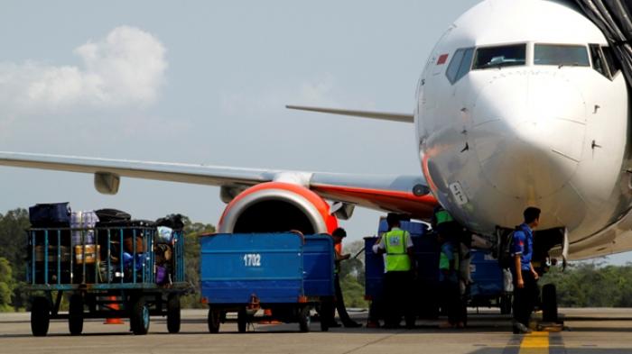 Ilustrasi pesawat di bandara.