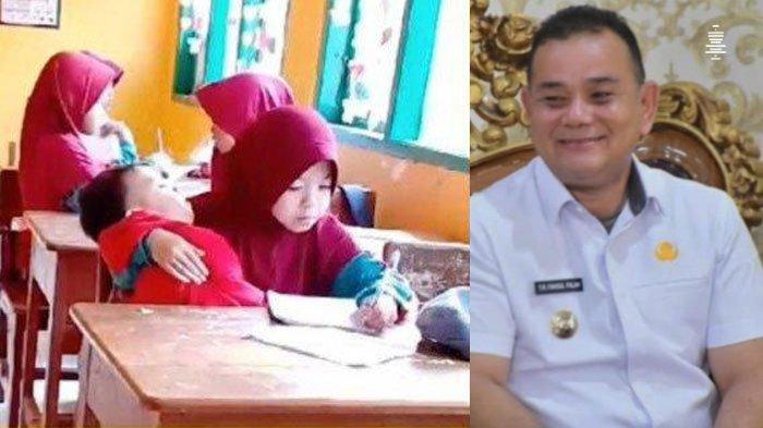 Nuraeni (kiri) Bocah SD Viral Gendong Adik ke Sekolah, Pj Bupati Sinjai TR Fahsul Falah (kanan).