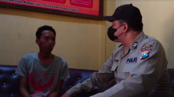 Khoiriyanto saat dimintai keterangan di Polsek Pasirian. Pria Lumajang ini ditangkap lantaran membacok tetangganya yang diduga selingkuh dengan istrinya.