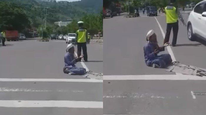 Aksi pria bersorban duduk di tengah jalan sambil berdoa, kesal kena tilang 1