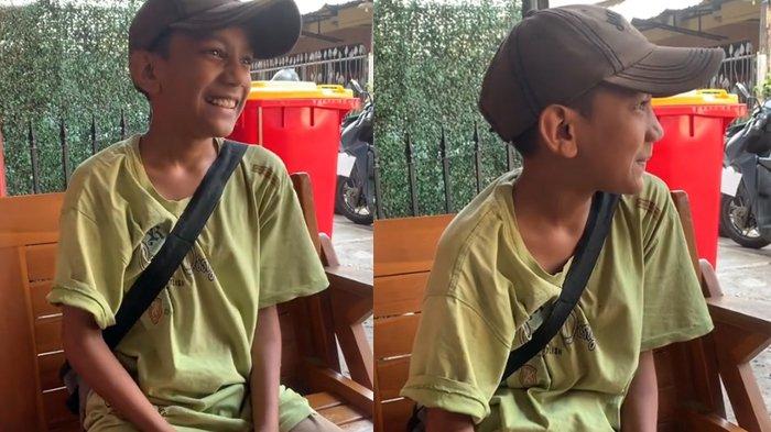 Bahu Ifan tampak miring akibat terlalus sering memikul beban berat