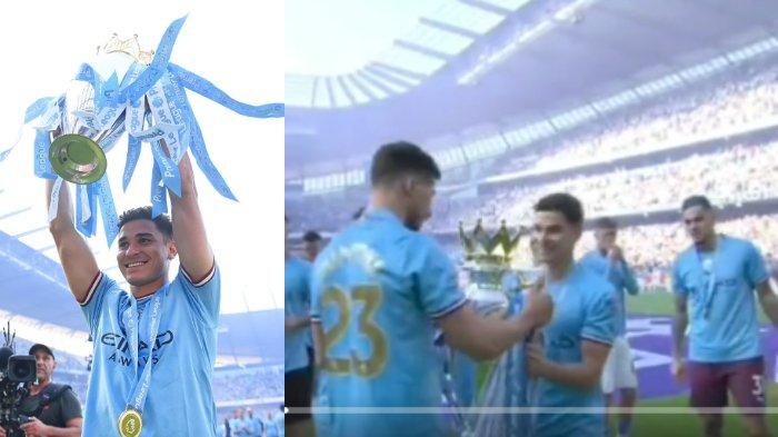 Bintang Manchester City, Julian Alvarez, sampai harus didorong sang kiper, Ederson, gara-gara malu-malu pamer piala Liga Premier.