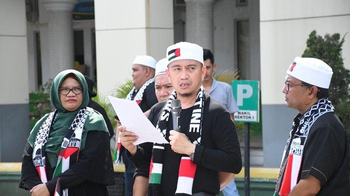 Pernyataan sikap berisi 10 item (dasasila) tuntunan civitas akademika Unmuha Aceh agar Israel menghentikan aksi genosidanya di Gaza, dibacakan oleh Wakil Rektor 1 Unmuha Aceh, Prof Asnawi Abdullah PhD.