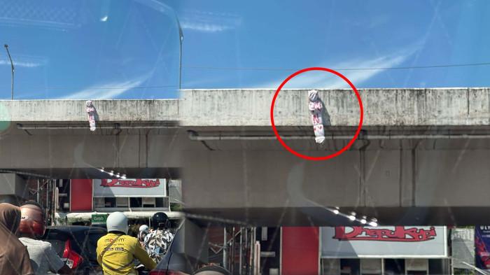 Kain putih mirip pocong tergantung di jembatan layang Simpang Surabaya Banda Aceh