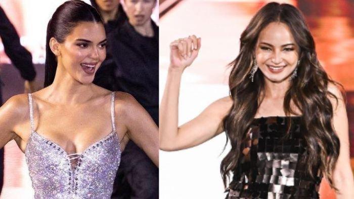 Potret Enzy Storia sepanggung dengan Kendall Jenner di ajang L'Oreal Paris Fashion Week.