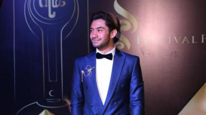 Reza Rahadian diabadikan saat menghadiri malam puncak Festival Film Indonesia (FFI) 2016 di Teater Jakarta Taman Ismail Marzuki, Jakarta. Minggu (6/11/2016). Ajang penghargaan bagi insan perfilman Indonesia FFI 2016 kali ini mengangkat tema Restorasi Film.