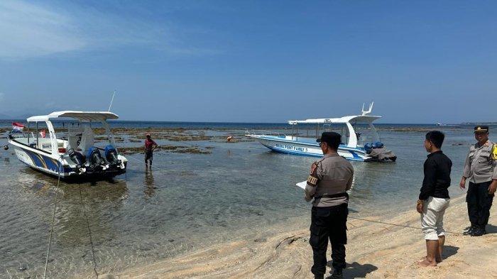 Polisi memasang garis polisi terhadap boat yang terlibat tabrakan maut di perairan Nusa Penida dan menewaskan wisatawan asal Jerman. 