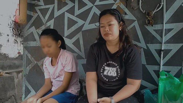 ISTRI - Komang Ayu, istri bersama anak pertama mendiang korban Kadek Parwata korban penusukan di Jalan Nangka, Denpasar, Bali saat ditemui di kediamannya. Anak kedua korban sempat didatangi lewat mimpi.