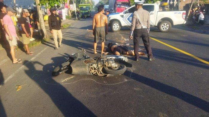 TKP - Petugas Satlantas Polres Jembrana saat melakukan penanganan dan olah TKP di lokasi kejadian lakalantas sebabkan korban jiwa di Jalan Raya Denpasar-Gilimanuk wilayah Desa Dangin Tukadaya, Kecamatan Jembrana, Jumat 2 Mei 2025.