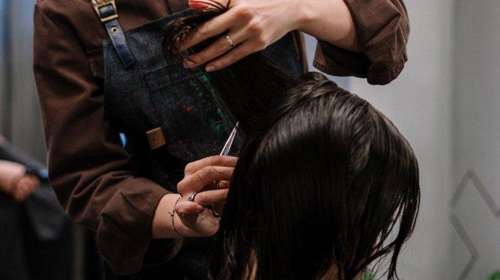 Ilustrasi potong rambut.