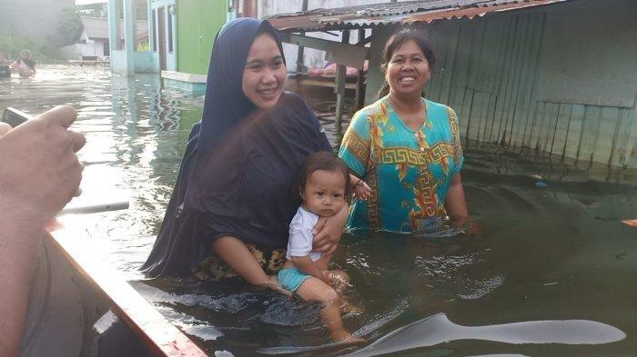 ILUSTRASI: Musibah banjir di kawasan Kecamatan Samarinda Utara, Kaltim saat musim penghujan tiba.TRIBUNKALTIM.CO/RITA LAVENIA