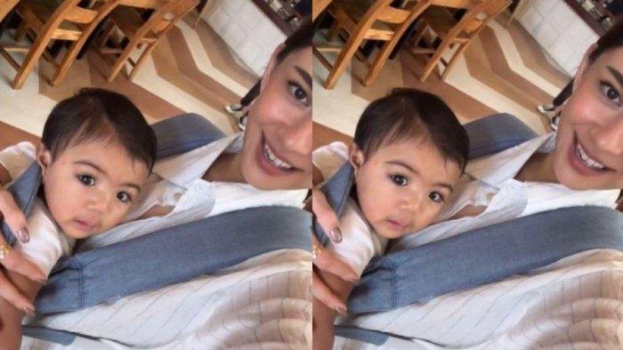 Potret Nana Mirdad bersama bayi yang ditemukannya dulu.