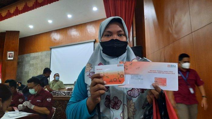 PKH cairan uang tunai di tangan warga miskin