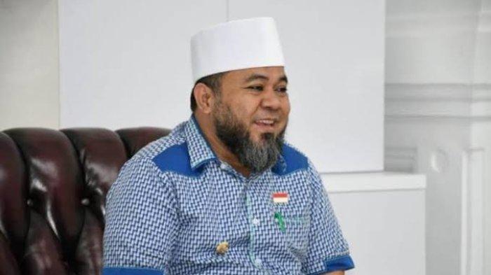 Helmi Hasan merupakan adik Ketua Umum PAN Zulkifli Hasan.