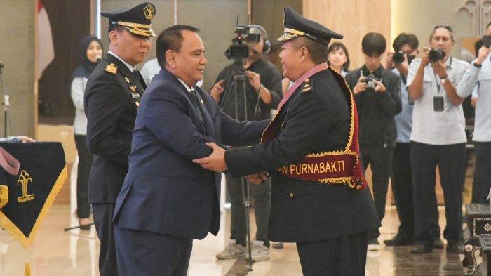 Upacara Wisuda bagi Pegawai Kemenkumham yang memasuki masa Purnabakti.