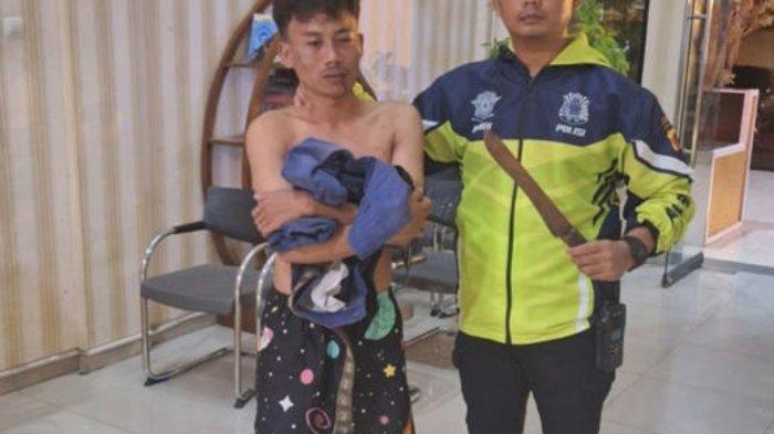 Ipda Subandi mengamankan satu dari tiga orang pelaku begal dengan kekerasan di Kota Bogor, Jawa Barat, Minggu (14/1/2024).