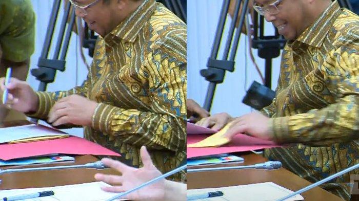 TERIMA AMPLOP - Tangkapan layar momen anggota DPR RI, Herman Khaeron menerima amplop coklat saat rapat dengan Pertamina. Ia membantah amplop tersebut uang sogokan, melainkan SPJJ, Rabu (12/3/2025).